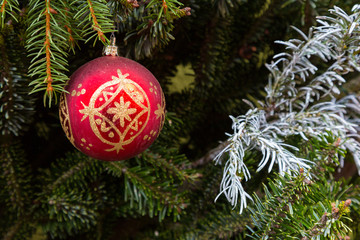 Closeup on Christmas tree decoration over festive background