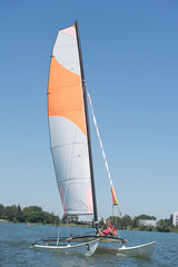 sailing on a lake - summer and sports theme