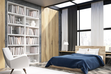 Corner of bedroom interior with bookcase