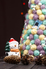 Christmas background with tree on wooden table