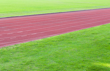 running track and green grass,Direct athletics Running track at Sport Stadium