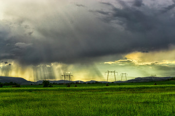 Storm clouds and sun