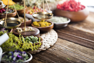 Assorted natural medical herbs and mortar