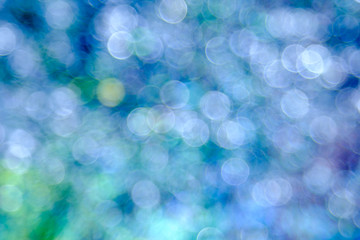 Blue bokeh background created by neon lights.