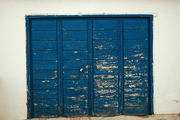 Blue wooden door worn