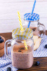 Blackberry smoothie in the glass jars