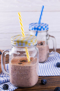 Blackberry smoothie in the glass jars