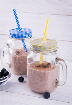 Blackberry smoothie in the glass jars
