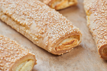 Homemade appetizers with cheese fillings. Cakes sprinkled with s