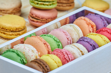 Colorful french macaroons in a box