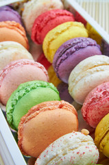 Colorful french macaroons in a box