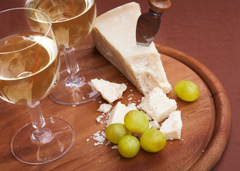 Wine with cheese and grapes