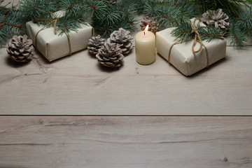 on wooden background Christmas tree and gifts