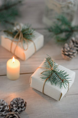 on wooden background Christmas tree and gifts