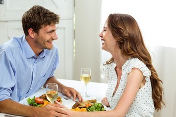 Happy romantic couple having lunch