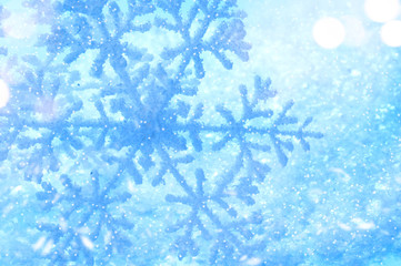 Winter holiday snow background. Snowflake
