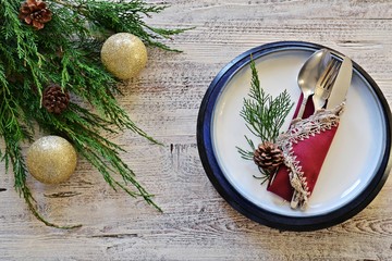 Christmas Plate and Cutllery Set on the wooden background