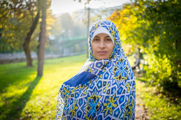 Muslim Arabic young beautiful woman in nature