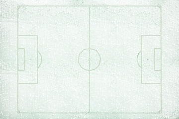 Green Football Stadium with winter snow background