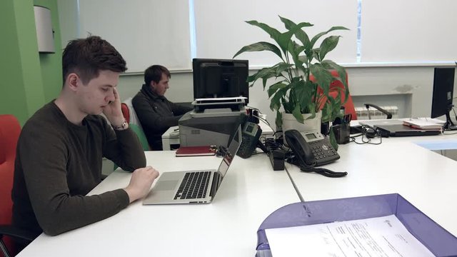 Two of Helpdesk Work in an Office