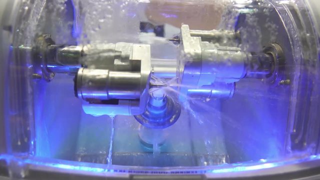 Dental milling machine (CAD/CAM) grinds the dental prosthesis