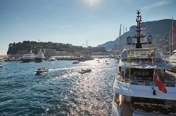 Papier Peint photo Porte Monaco, Monte-Carlo, 29 September 2016: World Fair MYS Monaco Yacht Show, Port Hercules, luxury megayachts, many shuttles, taxi boat, presentations, Journalists, boat traffic, Azur water