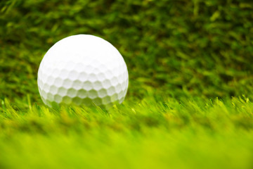 golf ball on green grass