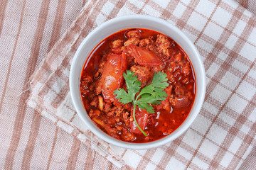 Close up spicy meat and tomato dip. Selective focus