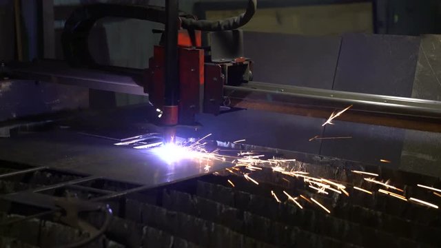 Cutting of metal. Sparks fly from plasma and metal interaction