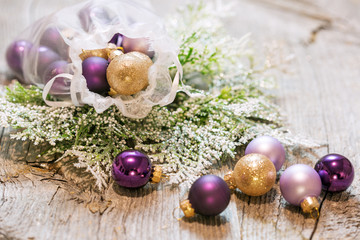 New Year's toys in bulk on a wooden background, card