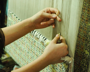 production and weaving of carpets and fabrics