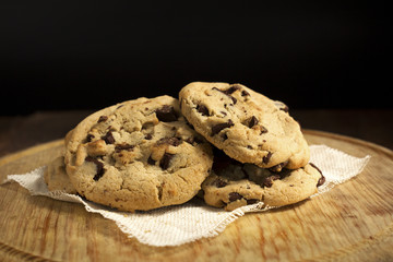 Cookies shot, closeup, on wooden table.