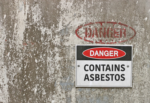 red, black and white Danger, Contains Asbestos warning sign