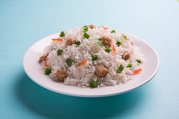 Yummy soya pulao or pilav or pulav or rice or soyabean chunk fried rice with peas and beans, indian...