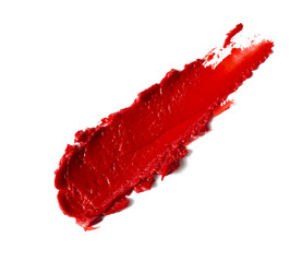 Smudged red color lipstick on background