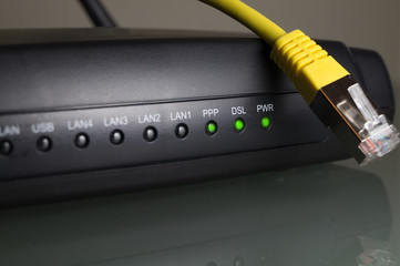 cable modem, wifi wlan router with yellow twisted pair cable