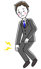 膝の痛み　ビジネスマン