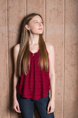 Fototapeta premium Beautiful teen girl in Red top