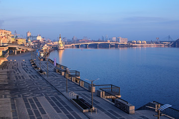 KYIV, UKRAINE – 16 November 2016: Morning view to the embankment near the river port. City landscape