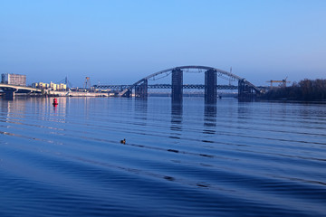 KYIV, UKRAINE – 16 November 2016: Morning view to the unfinished bridge. City landscape 