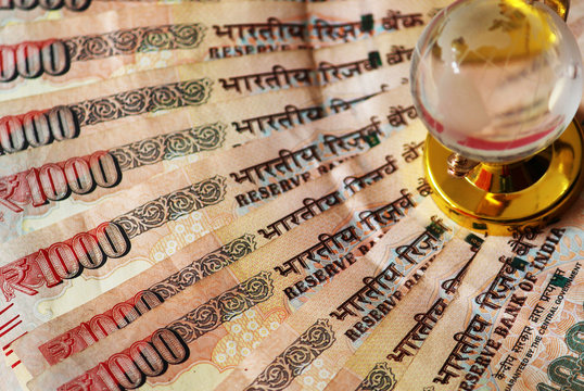 Indian Rs. 1,000 with transparent globe for business wallpaper  