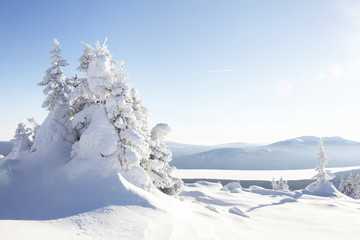 View of lake from mountain range Zyuratkul, winter landscape