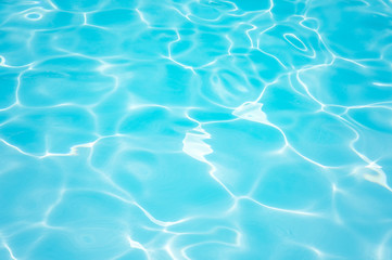 Blue water surface and ripple wave in pool