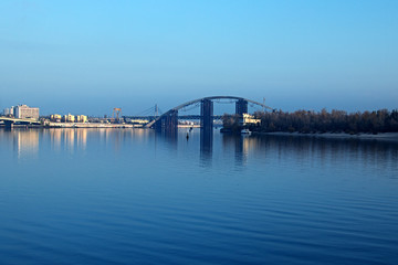 Morning view to the unfinished bridge. City landscape. Trukhanov island