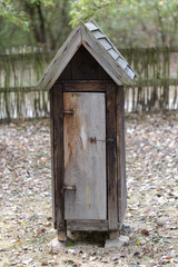 Old rustick retro beehive in village garden