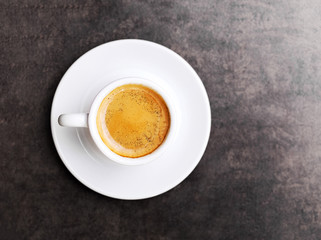 Cup of hot espresso coffee on wood table, espresso brew from ara