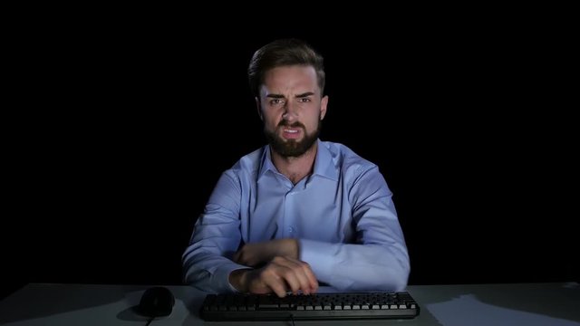 Young man disgusted by viewing the uploaded file