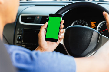 man using maps app on phone in car, phone green screen easy for