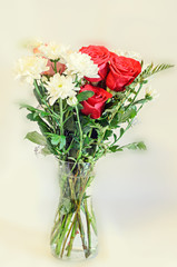 Bouquet with colored rose flowers, eustoma and chrysanthemums