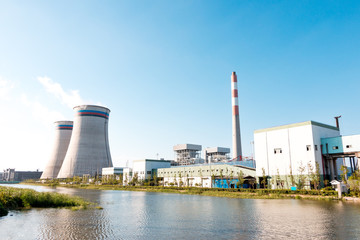 modern power plant near water